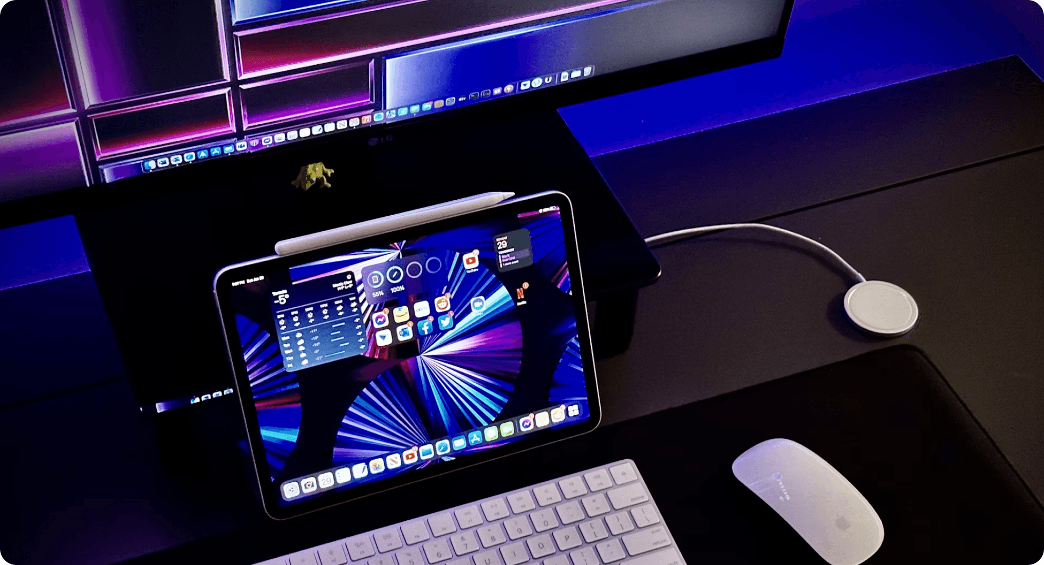 A desktop and tablet arranged in a modern workspace
